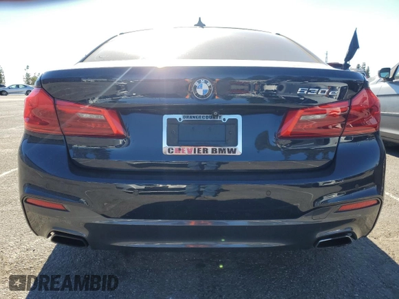 2020 BMW 5 Series 530e with VIN WBAJA9C00LCD60874, listed as a Copart auction lot 87960825 with 91,036 mi miles and Salvage Title. Bid and sale history available at DreamBid. Image 6.
