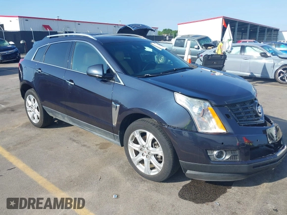 2014 Cadillac SRX Performance Collection with VIN 3GYFNCE39ES613051, listed as a IAAI auction lot 42113063 with 82,952 mi miles and . Bid and sale history available at carsss.com. Image 1.
