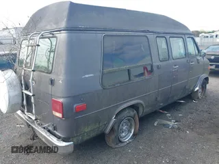 1989 Chevrolet Chevy Van z VIN 1GBEG25K9K7155815, wystawiony jako IAAI lot #41926158 z przebiegiem 634 259 mil mil oraz . Historia ofert i sprzedaży dostępna na DreamBid. Obrazek 4.