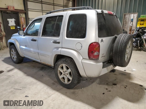 2003 Jeep Liberty Limited with VIN 1J4GL58KX3W707501, listed as a Copart auction lot 88082695 with 192,250 mi miles and Salvage Title. Bid and sale history available at DreamBid. Image 2.