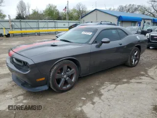 2013 Dodge Challenger SXT z VIN 2C3CDYAG7DH686930, wystawiony jako Copart lot #52043915 z przebiegiem 119 663 mil mil oraz Szkody całkowita. Historia ofert i sprzedaży dostępna na DreamBid. Obrazek 1.