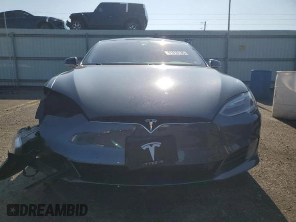 2017 Tesla Model S 100D с VIN 5YJSA1E2XHF185516, выставлен на аукционе Copart как лот 61816135 с пробегом 132 267 миль миль и Списание • Salvage title. История ставок и продаж доступна на DreamBid. Изображение 5.