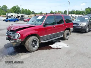 2000 Ford Explorer XLT z VIN 1FMZU73E7YZB60956, wystawiony jako IAAI lot #42218666 z przebiegiem 234 289 mil mil oraz . Historia ofert i sprzedaży dostępna na DreamBid. Obrazek 18.
