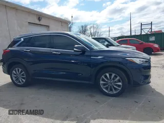 2021 Infiniti QX50 Luxe with VIN 3PCAJ5BB7MF123895, listed as a IAAI auction lot 41811100 with 23,164 mi miles and . Bid and sale history available at DreamBid. Image 14.