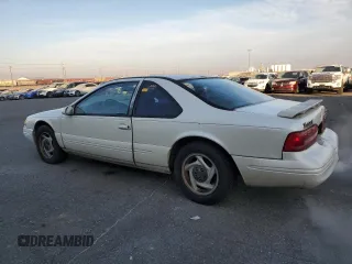 1996 Ford Thunderbird LX with VIN 1FALP62W0TH162431, listed as a Copart auction lot 41864445 with 183,798 mi miles and Salvage Title. Bid and sale history available at DreamBid. Image 2.