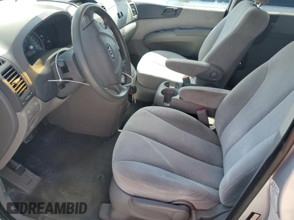 2008 Kia Sedona LX with VIN KNDMB233986220663, listed as a Copart auction lot 54321825 with 125,504 mi miles and Salvage Title. Bid and sale history available at DreamBid. Image 7.