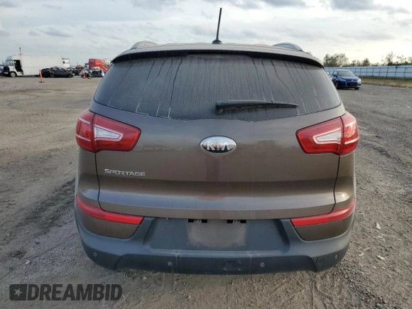 2013 Kia Sportage LX z VIN KNDPB3A23D7465413, wystawiony jako Copart lot #83694894 z przebiegiem 122 467 mil mil oraz Szkoda całkowita • Salvage title. Historia ofert i sprzedaży dostępna na DreamBid. Obrazek 6.