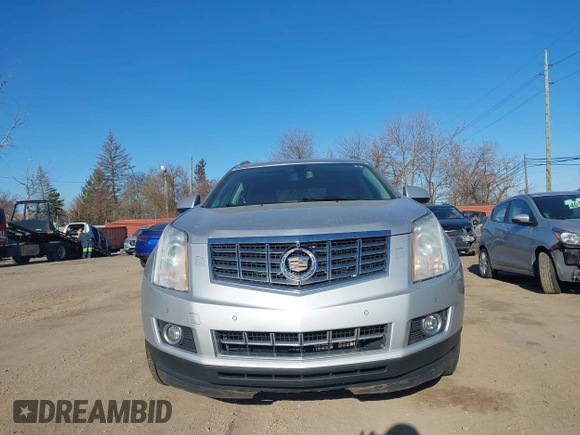 2013 Cadillac SRX Performance Collection z VIN 3GYFNHE33DS540108, wystawiony jako IAAI lot #42061957 z przebiegiem 182 797 mil mil oraz . Historia ofert i sprzedaży dostępna na DreamBid. Obrazek 12.