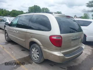 2005 Chrysler Town & Country Touring z VIN 2C8GP54L25R491310, wystawiony jako IAAI lot #42363567 z przebiegiem 203 608 mil mil oraz . Historia ofert i sprzedaży dostępna na DreamBid. Obrazek 3.