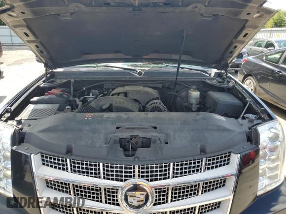 2011 Cadillac Escalade ESV Platinum Edition z VIN 1GYS4KEF3BR273514, wystawiony jako Copart lot #66936294 z przebiegiem 166 611 mil mil oraz Szkoda całkowita • Salvage title. Historia ofert i sprzedaży dostępna na DreamBid. Obrazek 13.