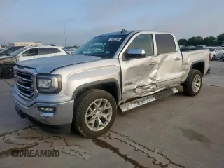 2018 GMC Sierra 1500 SLT with VIN 3GTP1NEC2JG624889, listed as a Copart auction lot 58042365 with 105,040 mi miles and Salvage title. Bid and sale history available at DreamBid. Image 1.