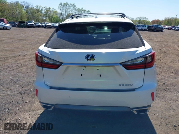 2019 Lexus RX 350 with VIN JTJBZMCA0K2041419, listed as a IAAI auction lot 42128084 with 98,994 mi miles and . Bid and sale history available at DreamBid. Image 16.
