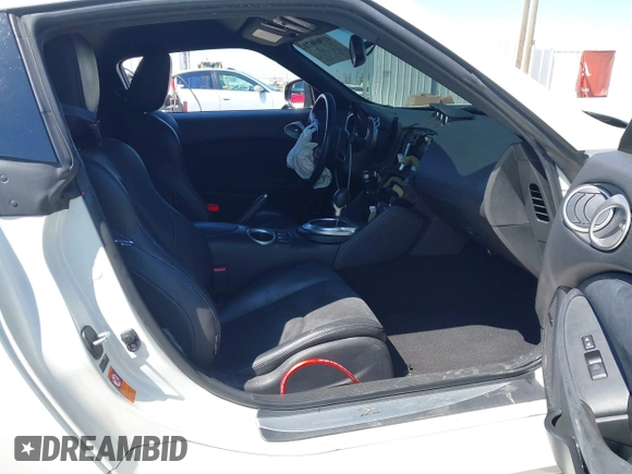 2009 Nissan 370Z Touring with VIN JN1AZ44E99M411252, listed as a IAAI auction lot 41969671 with 91,873 mi miles and . Bid and sale history available at DreamBid. Image 5.