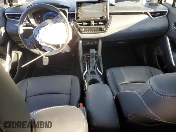 2022 Toyota Corolla Cross XLE z VIN 7MUDAABG2NV043649, wystawiony jako Copart lot #76577044 z przebiegiem 9 495 mil mil oraz Szkoda całkowita • Salvage title. Historia ofert i sprzedaży dostępna na DreamBid. Obrazek 8.