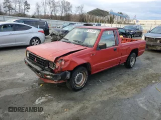 1991 Mitsubishi Mighty Max with VIN JA7FL24W3MP017705, listed as a Copart auction lot 85737304 with 261,896 mi miles and Salvage Title. Bid and sale history available at DreamBid. Image 1.