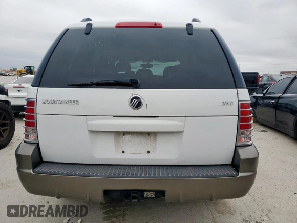 2004 Mercury Mountaineer Convenience z VIN 4M2ZU86K14ZJ30867, wystawiony jako Copart lot #51839405 z przebiegiem 184 668 mil mil oraz Szkoda całkowita • Salvage title. Historia ofert i sprzedaży dostępna na DreamBid. Obrazek 6.