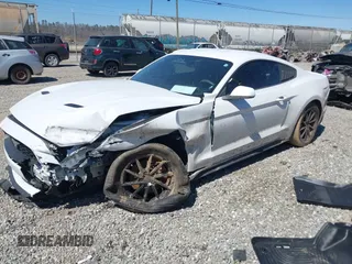 2018 Ford Mustang EcoBoost z VIN 1FA6P8TH9J5101182, wystawiony jako IAAI lot #41847168 z przebiegiem 98 168 mil mil oraz . Historia ofert i sprzedaży dostępna na DreamBid. Obrazek 18.
