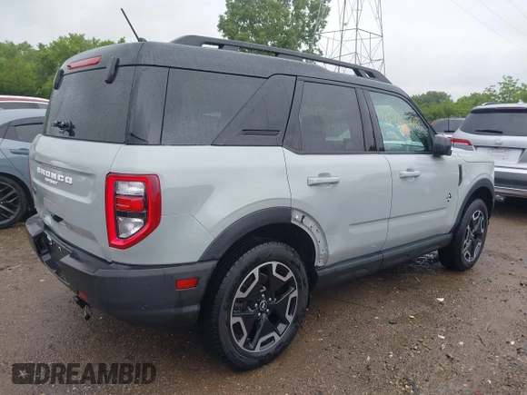 2023 Ford Bronco Sport Outer Banks z VIN 3FMCR9C61PRD19727, wystawiony jako IAAI lot #42315280 z przebiegiem 69 985 mil mil oraz . Historia ofert i sprzedaży dostępna na DreamBid. Obrazek 4.