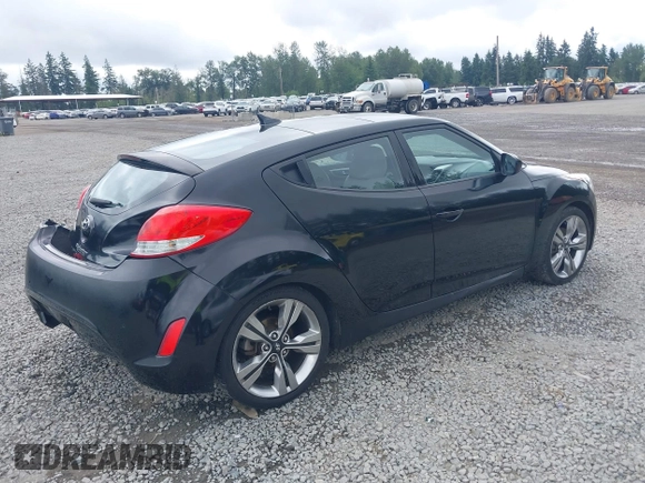 2012 Hyundai Veloster w/Gray Int with VIN KMHTC6AD4CU062034, listed as a IAAI auction lot 42371790 with 116,861 mi miles and . Bid and sale history available at DreamBid. Image 4.
