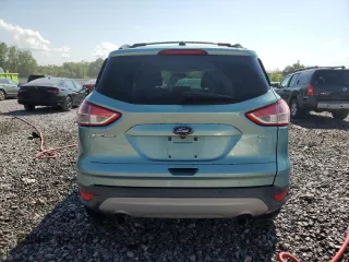 2013 Ford Escape SE with VIN 1FMCU0G99DUD03147, listed as a Copart auction lot 60152775 with 156,551 mi miles and Salvage title. Bid and sale history available at DreamBid. Image 6.