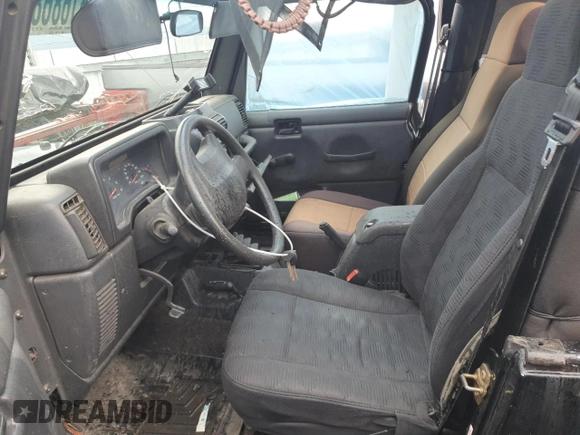 2004 Jeep Wrangler Sport with VIN 1J4FA49S04P751464, listed as a Copart auction lot 61686865 with Not provided miles and Salvage title. Bid and sale history available at DreamBid. Image 7.