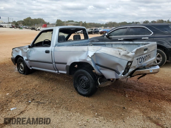 1990 Toyota Pickup DX с VIN JT4RN81P1L5069533, выставлен на аукционе Copart как лот 78433024 с пробегом 277 999 миль миль и Списание • Salvage title. История ставок и продаж доступна на DreamBid. Изображение 2.
