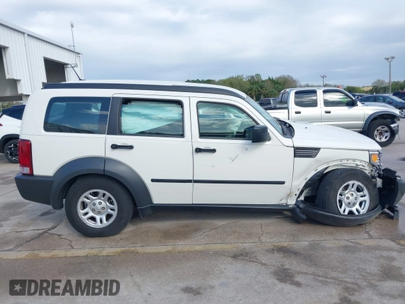 2008 Dodge Nitro SXT z VIN 1D8GT28K98W113494, wystawiony jako IAAI lot #41728030 z przebiegiem 31 397 mil mil oraz . Historia ofert i sprzedaży dostępna na DreamBid. Obrazek 13.
