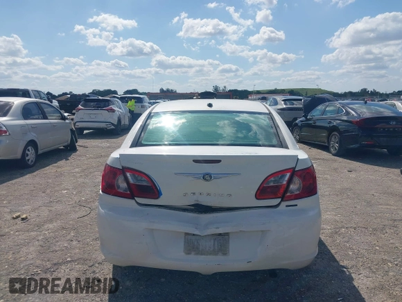 2007 Chrysler Sebring Touring with VIN 1C3LC56K37N533469, listed as a IAAI auction lot 42001566 with 187,698 mi miles and . Bid and sale history available at DreamBid. Image 16.