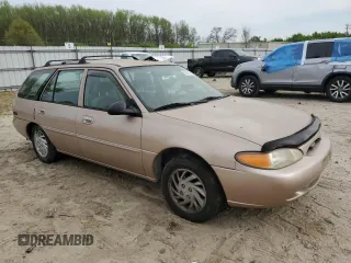 1999 Ford Escort SE with VIN 3FAFP15P0XR167167, listed as a Copart auction lot 52094765 with 154,960 mi miles and Salvage Title. Bid and sale history available at carsss.com. Image 4.