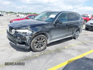 2016 BMW X5 xDrive50i with VIN 5UXKR6C51G0J81658, listed as a IAAI auction lot 41801382 with 34,572 mi miles. Bid and sale history available at carsss.com. Image 2.
