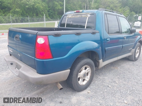 2001 Ford Explorer Sport Trac z VIN 1FMZU77E11UC71161, wystawiony jako IAAI lot #42184342 z przebiegiem 196 240 mil mil oraz . Historia ofert i sprzedaży dostępna na DreamBid. Obrazek 4.