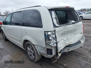 2012 Dodge Grand Caravan SXT with VIN 2C4RDGCG8CR294836, listed as a IAAI auction lot 41995385 with 184,475 mi miles and . Bid and sale history available at DreamBid. Image 3.
