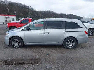 2011 Honda Odyssey EX-L with VIN 5FNRL5H60BB012206, listed as a IAAI auction lot 41982987 with 220,913 mi miles and . Bid and sale history available at carsss.com. Image 14.