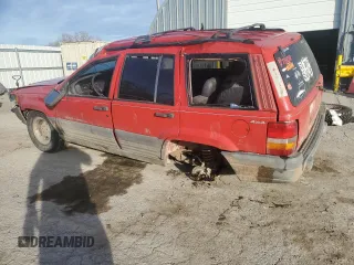 1998 Jeep Grand Cherokee Laredo with VIN 1J4GZ58S7WC105854, listed as a Copart auction lot 82321254 with 178,072 mi miles and Salvage Title. Bid and sale history available at carsss.com. Image 2.