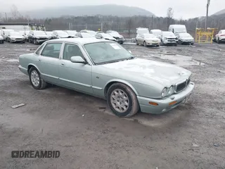 1998 Jaguar XJ with VIN SAJHN1242WC819689, listed as a IAAI auction lot 41148530 with 60,143 mi miles and . Bid and sale history available at DreamBid. Image 1.