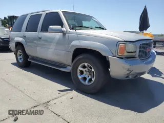 1999 GMC Denali z VIN 1GKEK13R6XR914411, wystawiony jako Copart lot #56063555 z przebiegiem 231 344 mil mil oraz Szkoda całkowita • Salvage title. Historia ofert i sprzedaży dostępna na DreamBid. Obrazek 4.