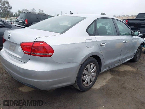 2013 Volkswagen Passat Wolfsburg Edition with VIN 1VWAP7A39DC126165, listed as a IAAI auction lot 41921572 with 132,992 mi miles. Bid and sale history available at carsss.com. Image 4.