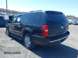 2009 Chevrolet Suburban LTZ with VIN 1GNFK36399J124158, listed as a IAAI auction lot 42063097 with 204,856 mi miles. Bid and sale history available at carsss.com. Image 3.
