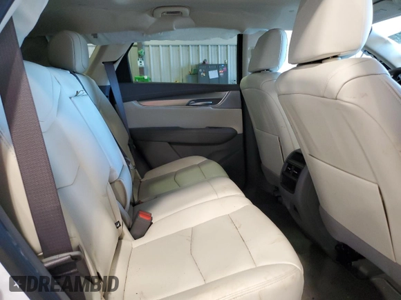 2025 Cadillac XT5 FWD Premium Luxury with VIN 1GYKNCRSXSZ106707, listed as a Copart auction lot 86919854 with 1,879 mi miles and Salvage Title. Bid and sale history available at DreamBid. Image 11.