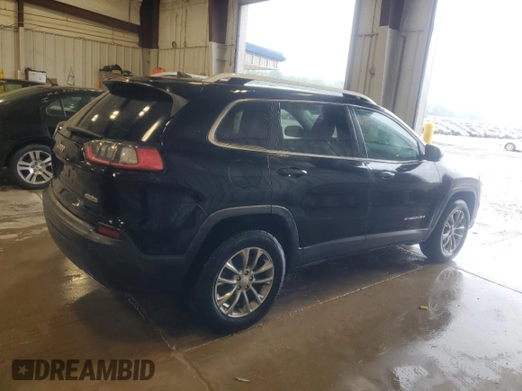 2019 Jeep Cherokee Altitude with VIN 1C4PJMLX5KD386597, listed as a Copart auction lot 59132655 with 129,243 mi miles and Salvage title. Bid and sale history available at DreamBid. Image 3.