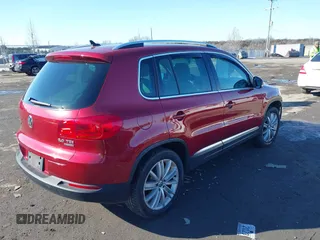 2012 Volkswagen Tiguan S with VIN WVGBV7AX2CW078629, listed as a IAAI auction lot 41332445 with 94,239 mi miles and . Bid and sale history available at DreamBid. Image 4.