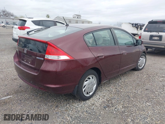 2011 Honda Insight LX z VIN JHMZE2H52BS004304, wystawiony jako IAAI lot #41827541 z przebiegiem 141 072 mil mil oraz . Historia ofert i sprzedaży dostępna na DreamBid. Obrazek 4.