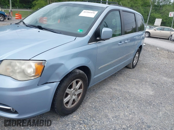 2013 Chrysler Town & Country Touring with VIN 2C4RC1BG6DR526577, listed as a IAAI auction lot 42204456 with 179,696 mi miles and . Bid and sale history available at DreamBid. Image 2.