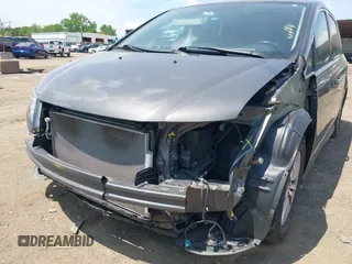 2014 Honda Odyssey EX-L z VIN 5FNRL5H64EB089875, wystawiony jako IAAI lot #42279431 z przebiegiem 107 716 mil mil oraz . Historia ofert i sprzedaży dostępna na DreamBid. Obrazek 6.