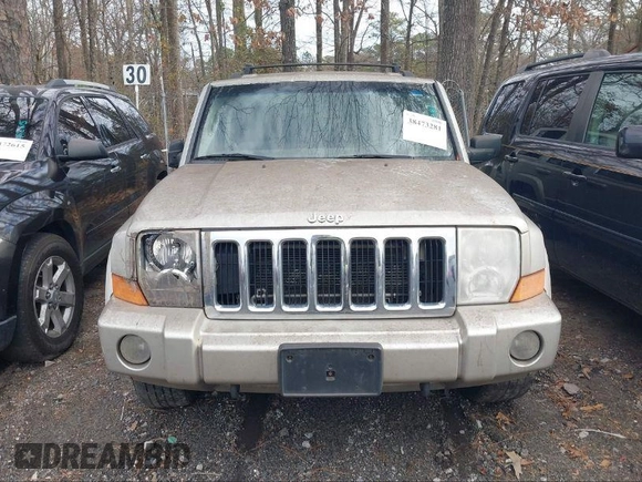 2007 Jeep Commander Sport z VIN 1J8HG48P47C672667, wystawiony jako IAAI lot #40423450 z przebiegiem 230 823 mil mil oraz . Historia ofert i sprzedaży dostępna na DreamBid. Obrazek 6.