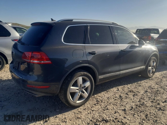 2012 Volkswagen Touareg Sport z VIN WVGFK9BP6CD001309, wystawiony jako Copart lot #52827875 z przebiegiem 153 250 mil mil oraz Czysty tytuł • Clean title. Historia ofert i sprzedaży dostępna na DreamBid. Obrazek 3.
