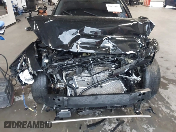 2019 Infiniti Q50 3.0t LUXE with VIN JN1EV7AP1KM512392, listed as a IAAI auction lot 40055915 with 103,485 mi miles. Bid and sale history available at carsss.com. Image 6.