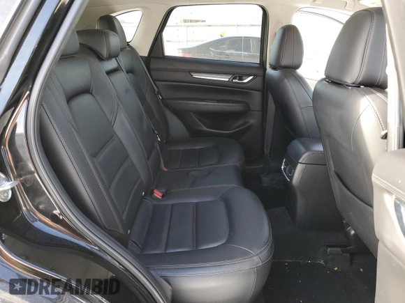 2021 Mazda CX-5 Grand Touring with VIN JM3KFBDM5M1456650, listed as a Copart auction lot 42124045 with 45,205 mi miles and Salvage Title. Bid and sale history available at carsss.com. Image 11.