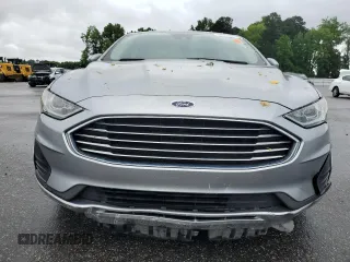 2020 Ford Fusion SE z VIN 3FA6P0HD0LR256243, wystawiony jako Copart lot #56513215 z przebiegiem 59 996 mil mil oraz Szkoda całkowita • Salvage title. Historia ofert i sprzedaży dostępna na DreamBid. Obrazek 5.