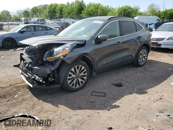 2020 Ford Escape Titanium с VIN 1FMCU9J99LUC63261, выставлен на аукционе Copart как лот 56312955 с пробегом Не указан миль и Списание • Salvage title. История ставок и продаж доступна на DreamBid. Изображение 1.